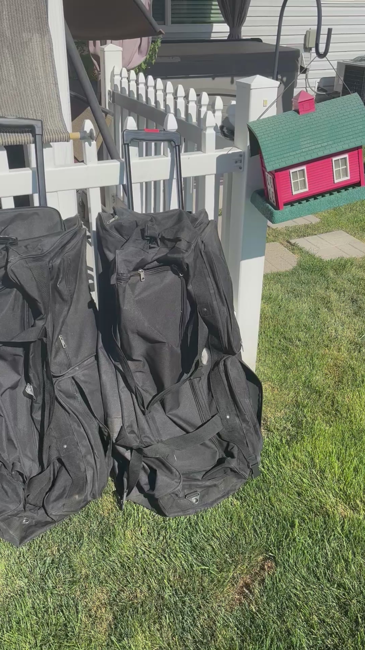Rolling duffle bag and carry hand bags