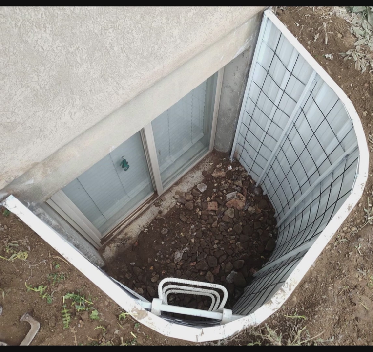 Window wells and window well covers